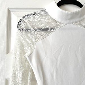 Bebe White Lace Bodysuit. Size XXS.